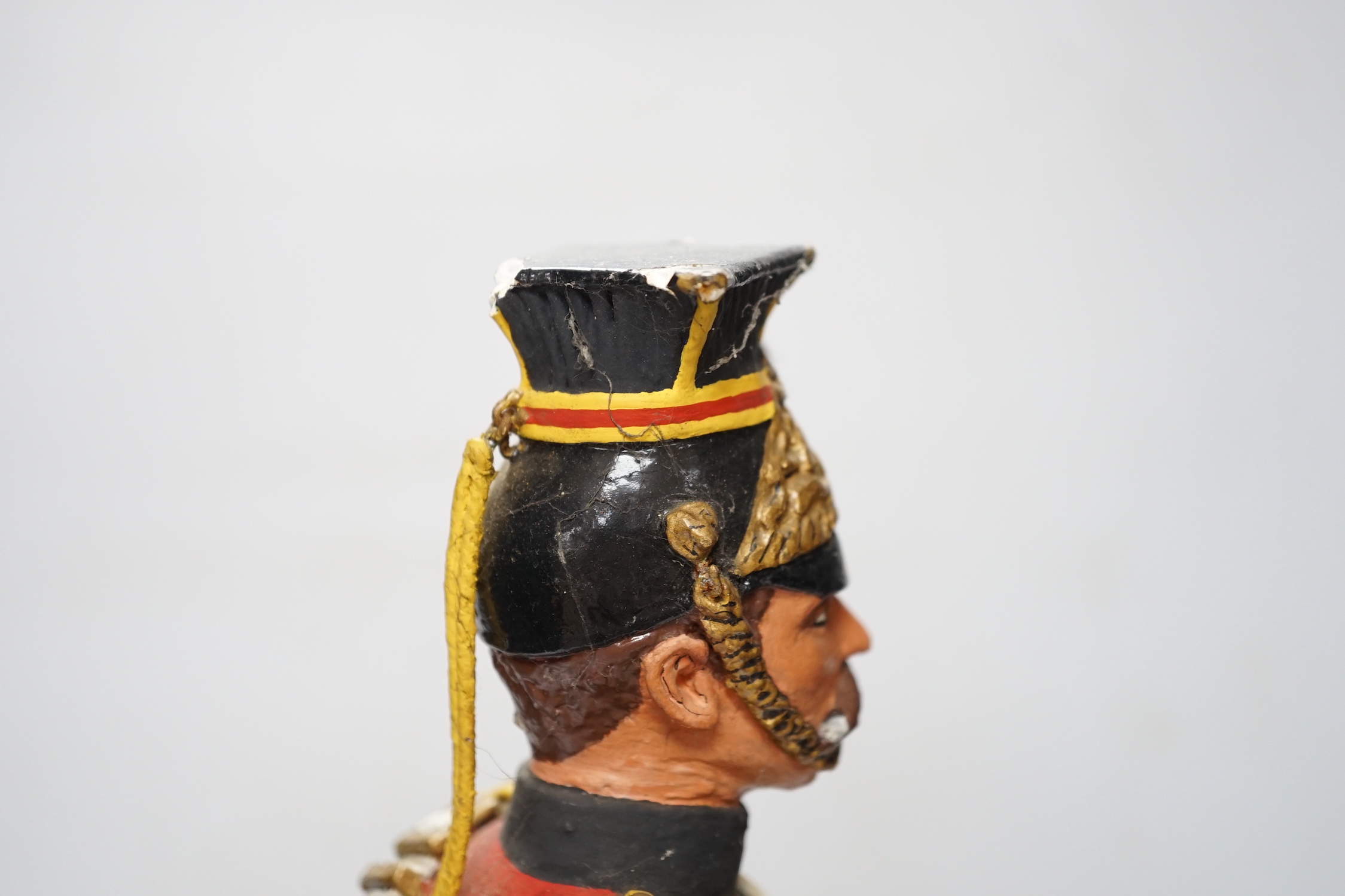 A painted plaster figure of a lancer, 48cm